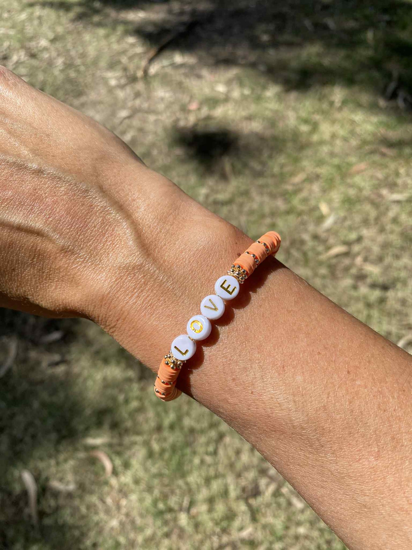 Peach pink LOVE beaded stretch bracelet Romy