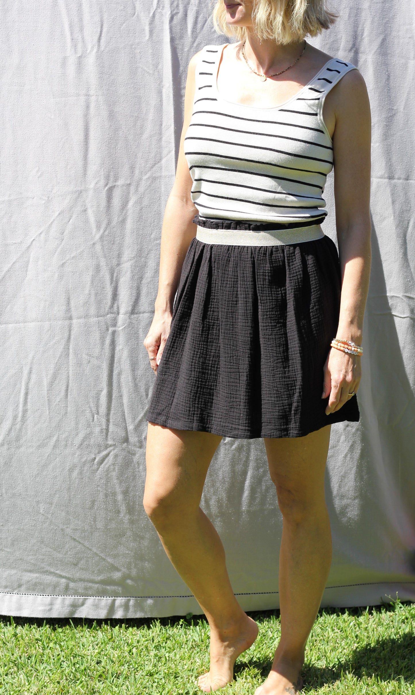 Short woman black skirt Harriet, double cloth fabric with golden elastic