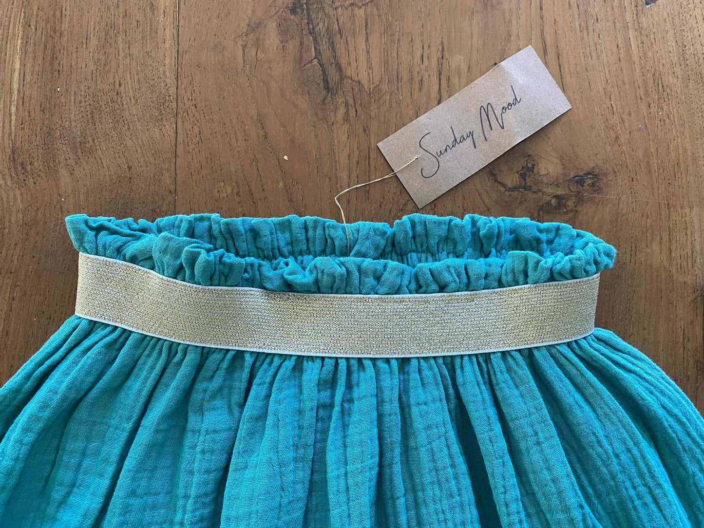 Girl skirt bright green Harriet, double cloth fabric with golden elastic