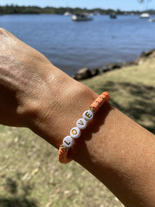 Peach pink LOVE beaded stretch bracelet Romy