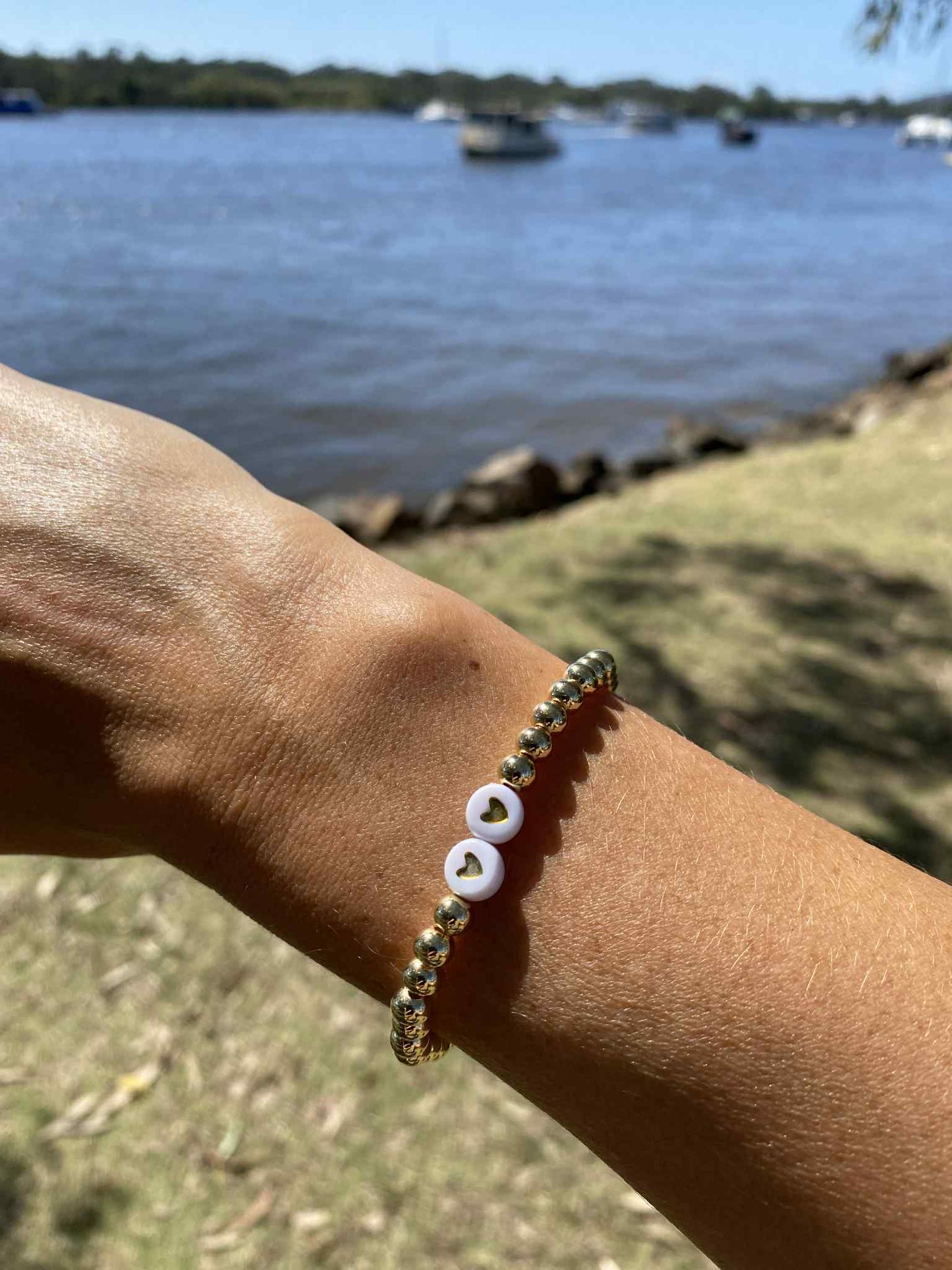 Golden stretch bracelet Scarlett 2 hearts