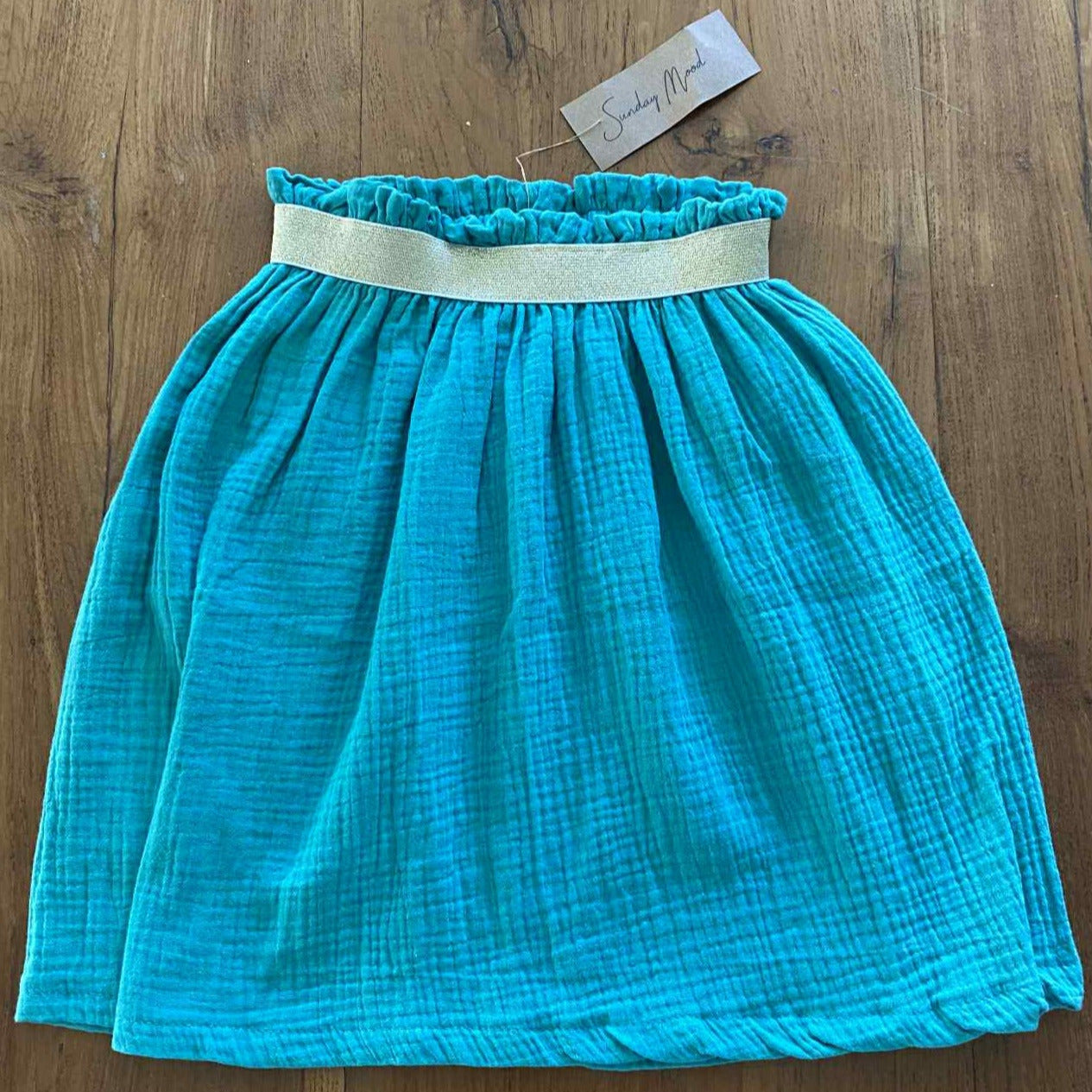 Girl skirt bright green Harriet, double cloth fabric with golden elastic