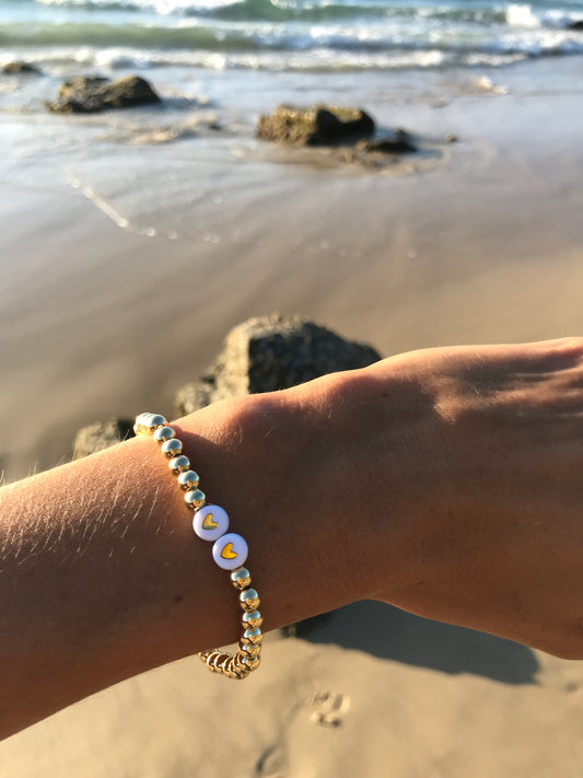 Golden stretch bracelet Scarlett 2 hearts