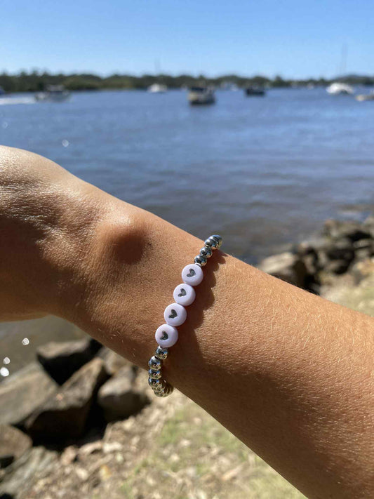Silvery stretch bracelet Scarlett 4 hearts